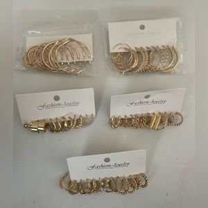 30 Pairs of gold hoop earrings